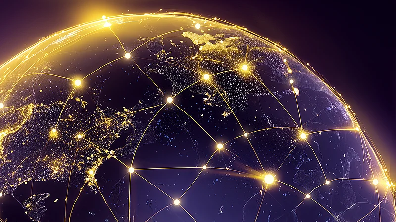 Eine leuchtende, digitale Darstellung der Erde, umspannt von einem globalen Netzwerk aus Verbindungen und Lichtpunkten, das die vernetzte und digitale SupplyX-Lieferkette symbolisiert.